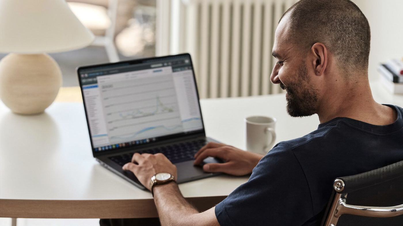 Property owner reviewing a statement on a laptop at home
